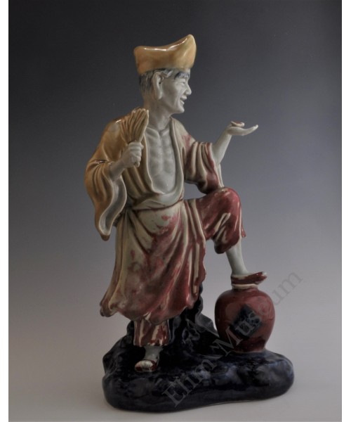 1657 An under glaze B&R statue of  the "drunken Monk"  